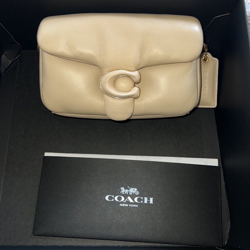 Ivory small tabby coach purse